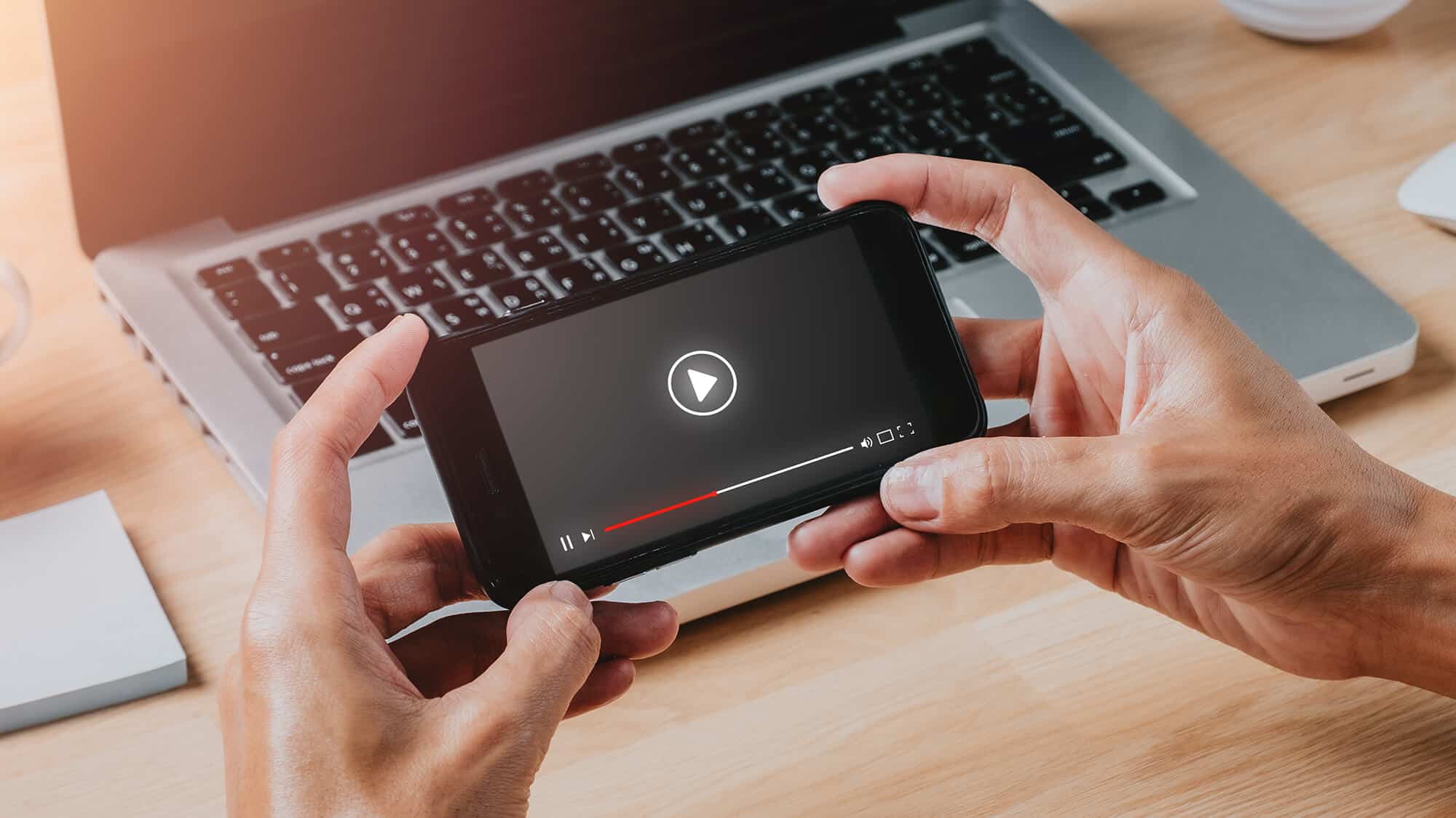 person streaming video on phone